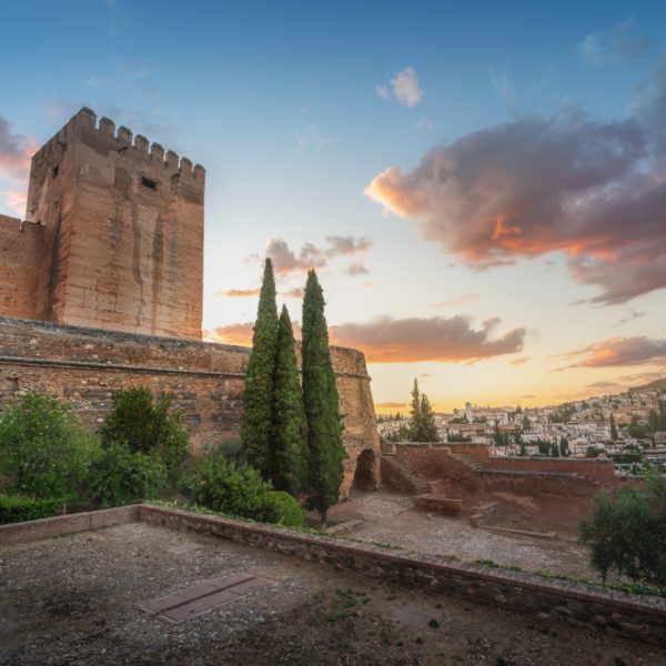 Alcazaba at sunset with Torre del Homenaje (Keep) and Turret Tower (Torre del Cubo) at Alhambra - Granada, Andalusia, Spain